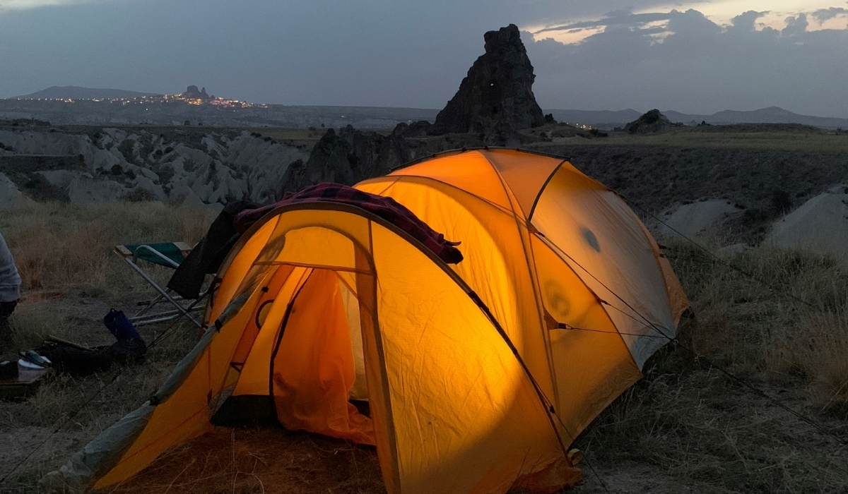 Glowing camping tent in Cappadocia at night