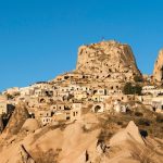 Uçhisar Castle seen from the valley on the Cappadocia Red Tour with Underground City