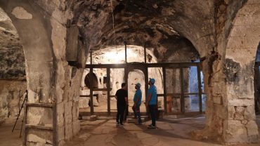 Aya Maryeros Underground Monastery Cappadocia – World’s Oldest Mental Hospital interior view with visitors.