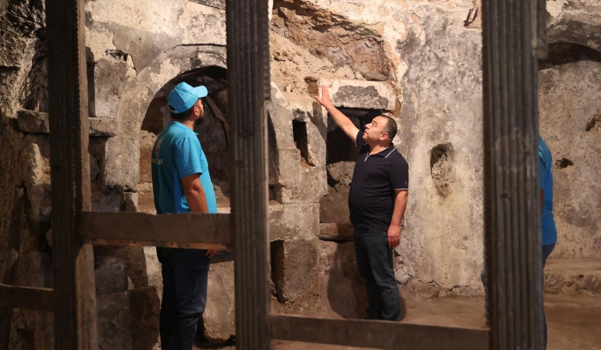 Restoration team analyzing the rock-carved structure inside Aya Maryeros Underground Monastery in Derinkuyu, Cappadocia, believed to be the world’s first mental hospital.